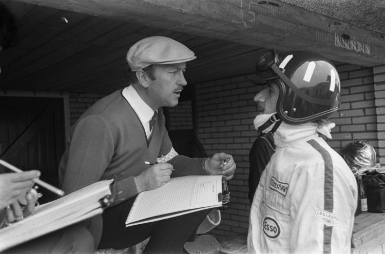  Colin Chapman Talking To Graham Hill In The 