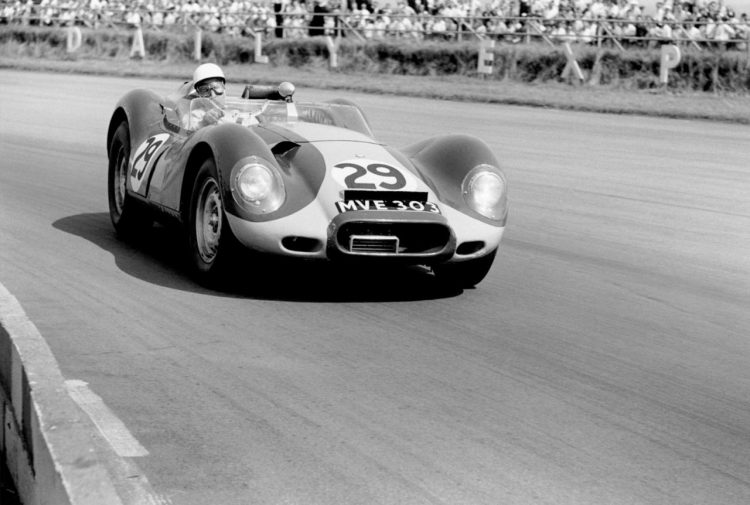  Stirling Moss Driving His Lister Jaguar To Victory 