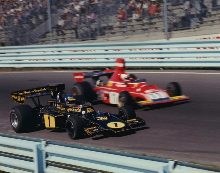  Ronnie Peterson In A Lotus 72E Being Overtaken By #F1