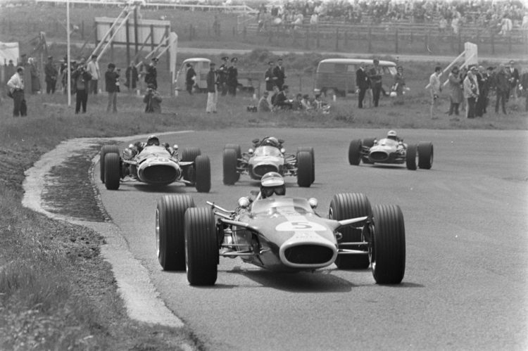  Jim Clark In The 5 Lotus 49 Closely Followed By #F1