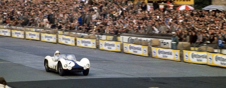 Masten Gregory Crossing The Finish Line In First